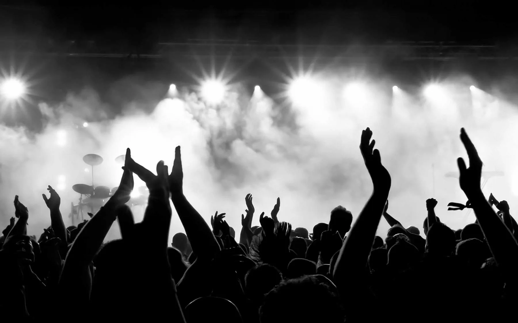 Concert audience under stage lights